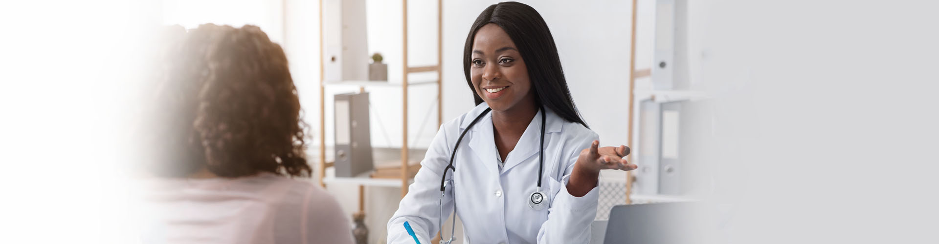doctor talking to her patient