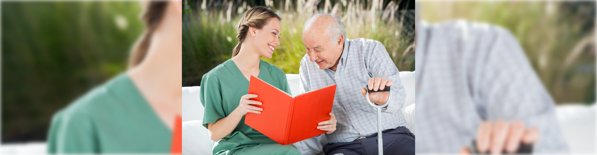caregiver showing book to senior